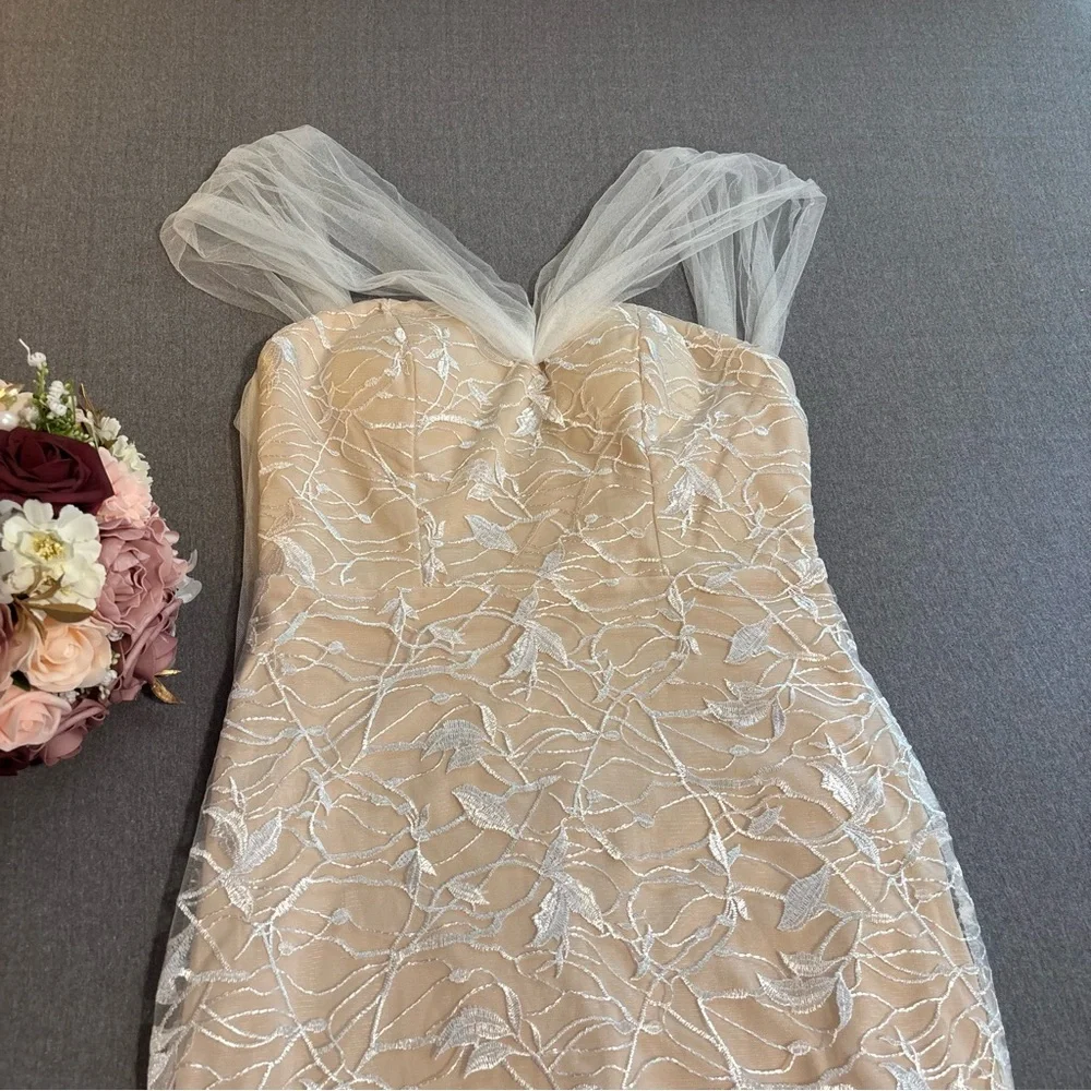 White Off-Shoulder Short Sleeve Wedding Gown